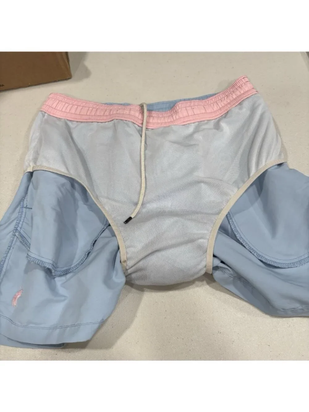 Polo Ralph Lauren has trunks pockets